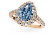 Halo Engagement Ring Setting for Fancy Blue Pear-Shaped Center with Narrowing Pave Band and Prong Head in Rose Gold
