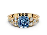 Cluster Engagement Ring Setting for Fancy Blue Cushion Cut Center with Bezel Accent Clusters and Prong Head in Yellow Gold