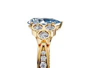 Cluster Engagement Ring Setting for Fancy Blue Pear-Shaped Center with Bezel Accent Clusters and Prong Head in Yellow Gold
