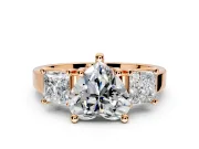 3 Stone Engagement Ring Setting for Heart-Shaped Center with Matching Side Accents and Prong Head in Rose Gold