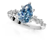 Solitaire Engagement Ring Setting for Fancy Blue Pear-Shaped Center with Trailing Leaf Accent Band and Prong Head in Platinum