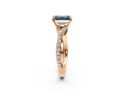 Crossover Engagement Ring Setting for Fancy Blue Emerald Cut Center with Pave and Plain Strands and Prong Head in Rose Gold