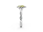 Halo Engagement Ring Setting for Fancy Yellow Pear-Shaped Center with Pave and Plain Twist Band and Prong Head in Platinum