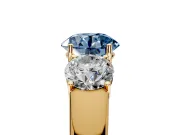 3 Stone Engagement Ring Setting for Fancy Blue Round Cut Center with Raised Basket Heads and Prong Head in Yellow Gold