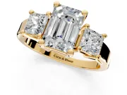3 Stone Engagement Ring Setting for Emerald Cut Center with Matching Side Accents and Prong Head in Yellow Gold