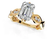 Solitaire Engagement Ring Setting for Emerald Cut Center with Accented Twist Band and Leaf Prong Head in Yellow Gold