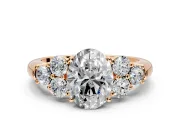 Cluster Engagement Ring Setting for Oval Center with Round Cut Accent Frame and Prong Head in Rose Gold