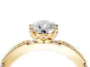 Solitaire Engagement Ring Setting for Pear-Shaped Center with Milgrain-Edged Pave Band and Prong Head in Yellow Gold
