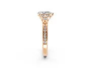 Cluster Engagement Ring Setting for Pear-Shaped Center with Bezel Accent Clusters and Prong Head in Rose Gold