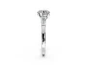 3 Stone Engagement Ring Setting for Round Cut Center with Channel Baguette Accents and Prong Head in Platinum