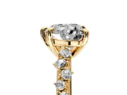 Solitaire Engagement Ring Setting for Heart-Shaped Center with Trailing Leaf Accent Band and Prong Head in Yellow Gold