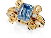 Solitaire Engagement Ring Setting for Fancy Blue Emerald Cut Center with Twisted Band and Scroll Prong Head in Yellow Gold