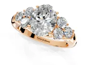 Cluster Engagement Ring Setting for Oval Center with Round Cut Accent Frame and Prong Head in Rose Gold