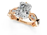 Solitaire Engagement Ring Setting for Radiant Cut Center with Accented Twist Band and Leaf Prong Head in Rose Gold