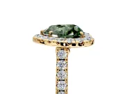 Halo Engagement Ring Setting for Fancy Green Heart-Shaped Center with Narrowing Pave Band and Prong Head in Yellow Gold