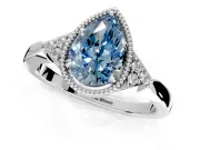 Cluster Engagement Ring Setting for Fancy Blue Pear-Shaped Center with Milgrain Shoulder Clusters and Prong Head in White Gold