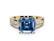 Solitaire Engagement Ring Setting for Fancy Blue Asscher Cut Center with Princess Cut Channel Band and Prong Head in Yellow Gold