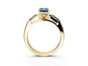 3 Stone Engagement Ring Setting for Fancy Blue Emerald Cut Center with Tapered Baguettes, Plain Band and Prong Head in Yellow Gold