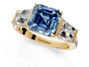 Channel-Set Engagement Ring Setting for Fancy Blue Asscher Cut Center with Baguette Band and Prong Head in Yellow Gold