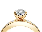 Solitaire Engagement Ring Setting for Pear-Shaped Center with Channel-Set Accents and Prong Head in Yellow Gold