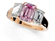 3 Stone Engagement Ring Setting for Fancy Pink Emerald Cut Center with Raised Basket Heads and Prong Head in Rose Gold