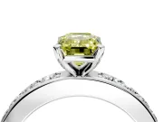 Solitaire Engagement Ring Setting for Fancy Yellow Emerald Cut Center with Channel-Set Accents and Prong Head in Platinum