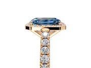 Halo Engagement Ring Setting for Fancy Blue Emerald Cut Center with Full Pave Band and Prong Head in Rose Gold
