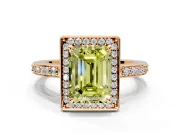 Halo Engagement Ring Setting for Fancy Yellow Emerald Cut Center with Metal-Rimmed Halo, Pave Band and Prong Head in Rose Gold