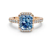 Halo Engagement Ring Setting for Fancy Blue Radiant Cut Center with Full Pave Band and Prong Head in Rose Gold