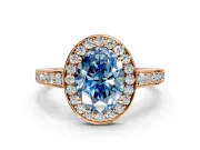 Bezel-Framed Halo Engagement Ring Setting for Fancy Blue Oval Center with Pave Band and Prong Head in Rose Gold
