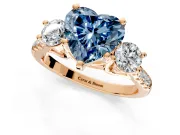 3 Stone Engagement Ring Setting for Fancy Blue Heart-Shaped Center with Crossover Basket, Pave Band and Prong Head in Rose Gold