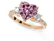 3 Stone Engagement Ring Setting for Fancy Pink Heart-Shaped Center with Round Cut Side Accents and Prong Head in Rose Gold