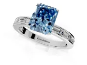 Solitaire Engagement Ring Setting for Fancy Blue Radiant Cut Center with Channel Baguette Band and Prong Head in Platinum