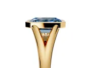 Solitaire Engagement Ring Setting for Fancy Blue Emerald Cut Center with V Split Shank and Bezel Head in Yellow Gold