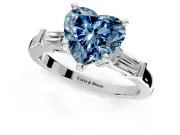 3 Stone Engagement Ring Setting for Fancy Blue Heart-Shaped Center with Channel Baguette Accents and Prong Head in Platinum