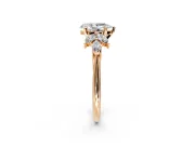 Floral Cluster Engagement Ring Setting for Pear-Shaped Center with Marquise Accents and Prong Head in Rose Gold