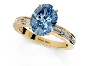 Solitaire Engagement Ring Setting for Fancy Blue Oval Center with Channel Baguette Band and Prong Head in Yellow Gold