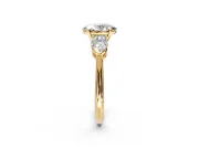 3 Stone Engagement Ring Setting for Oval Center with Large Pear-Shaped Accents and Prong Head in Yellow Gold