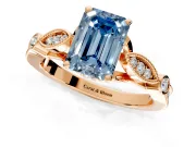 Solitaire Engagement Ring Setting for Fancy Blue Emerald Cut Center with Marquise and Bezel Accents and Prong Head in Rose Gold