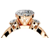 3 Stone Engagement Ring Setting for Heart-Shaped Center with Pave Twist Band and Prong Head in Rose Gold
