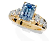 Solitaire Engagement Ring Setting for Fancy Blue Emerald Cut Center with Graduated Shared Prongs and Prong Head in Yellow Gold