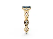 Solitaire Engagement Ring Setting for Fancy Blue Emerald Cut Center with Accented Twist Band and Leaf Prong Head in Yellow Gold