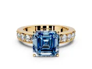 Solitaire Engagement Ring Setting for Fancy Blue Asscher Cut Center with Channel-Set Accents and Prong Head in Yellow Gold