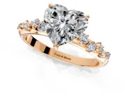 Cluster Engagement Ring Setting for Heart-Shaped Center with Round Cut Accent Band and Prong Head in Rose Gold