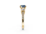3 Stone Engagement Ring Setting for Fancy Blue Round Cut Center with Crossover Basket, Pave Band and Prong Head in Yellow Gold