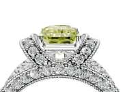 Pave Engagement Ring Setting for Fancy Yellow Radiant Cut Center with Curved Accent Rows, Openwork and Prong Head in White Gold
