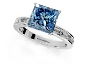 Solitaire Engagement Ring Setting for Fancy Blue Princess Cut Center with Channel Baguette Band and Prong Head in White Gold