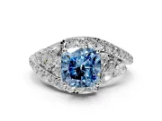 Halo Engagement Ring Setting for Fancy Blue Cushion Cut Center with Marquise and Pave Bypass Band and Prong Head in Platinum