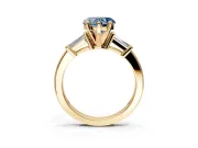 3 Stone Engagement Ring Setting for Fancy Blue Heart-Shaped Center with Channel Baguette Accents and Prong Head in Yellow Gold
