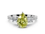 3 Stone Engagement Ring Setting for Fancy Yellow Pear-Shaped Center with Round Cut Side Accents and Prong Head in Platinum